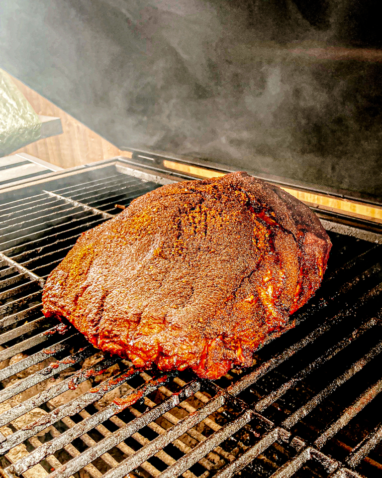 Meat cooking on Betsy, SMOKED BBQs unique smoker